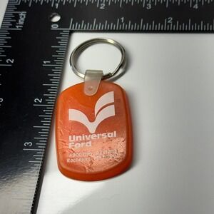 Vintage Universal Ford Keychain Orange Advertising Memorabilia Rochester MN‎